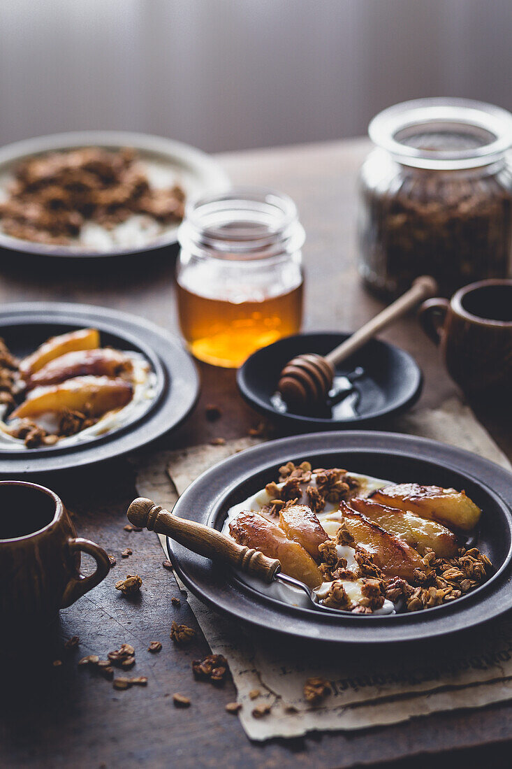 Breakfast with granola, caramelized pears and vegan yoghurt