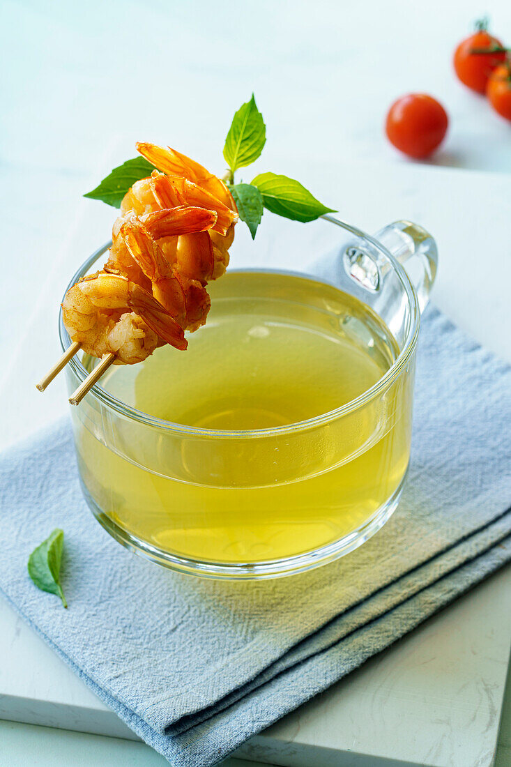 Tomato consomme with shrimps