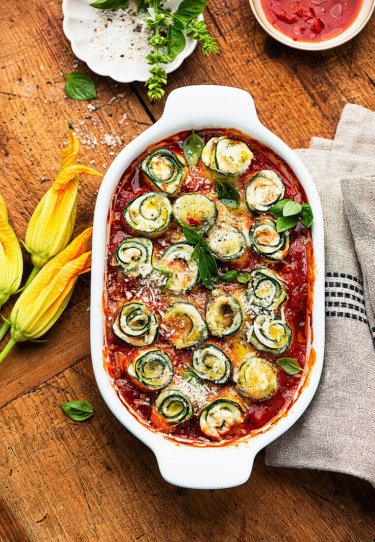 Courgette rolls with ricotta and tomato sauce
