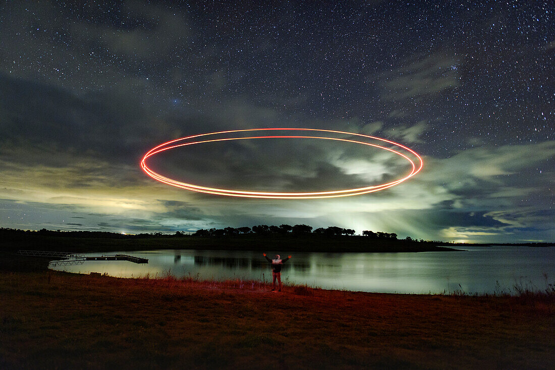 Circular light painting in the sky
