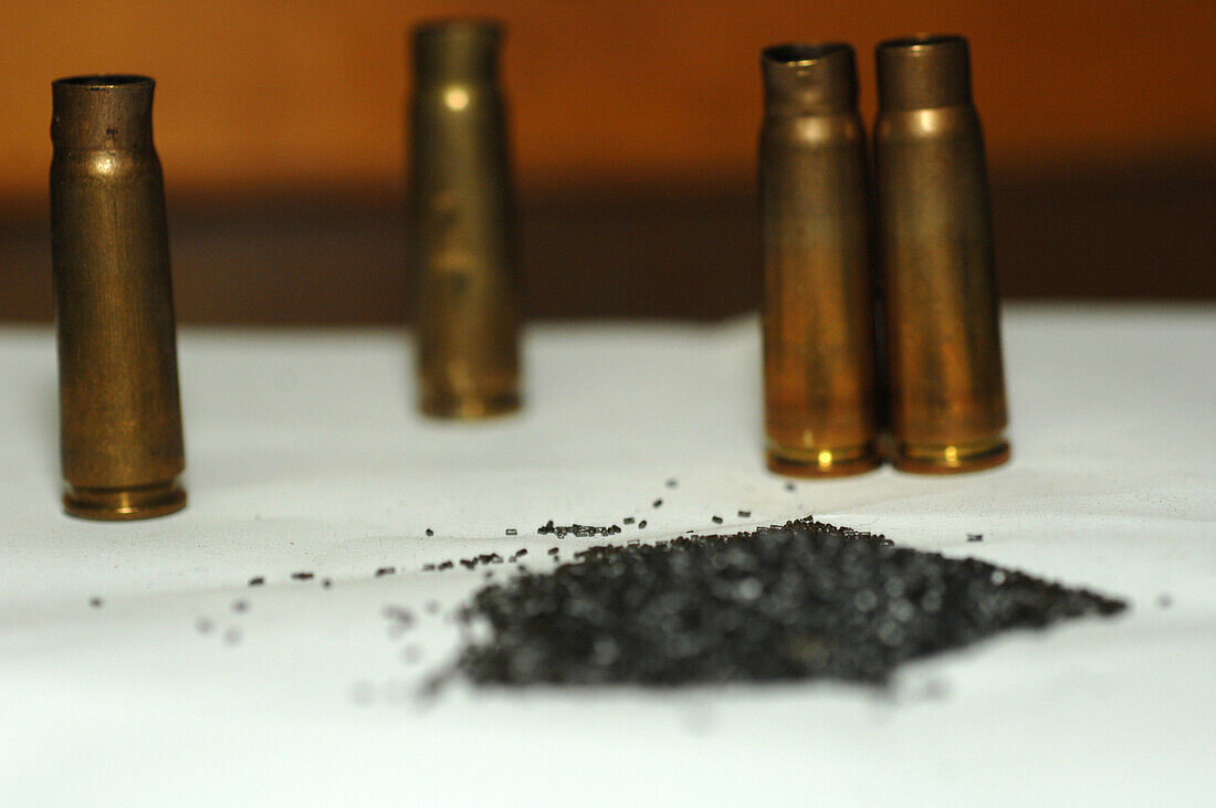 Gunpowder surrounded by bullet cartridge casings
