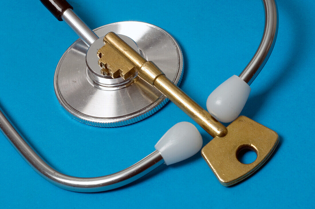 Key on top of a stethoscope
