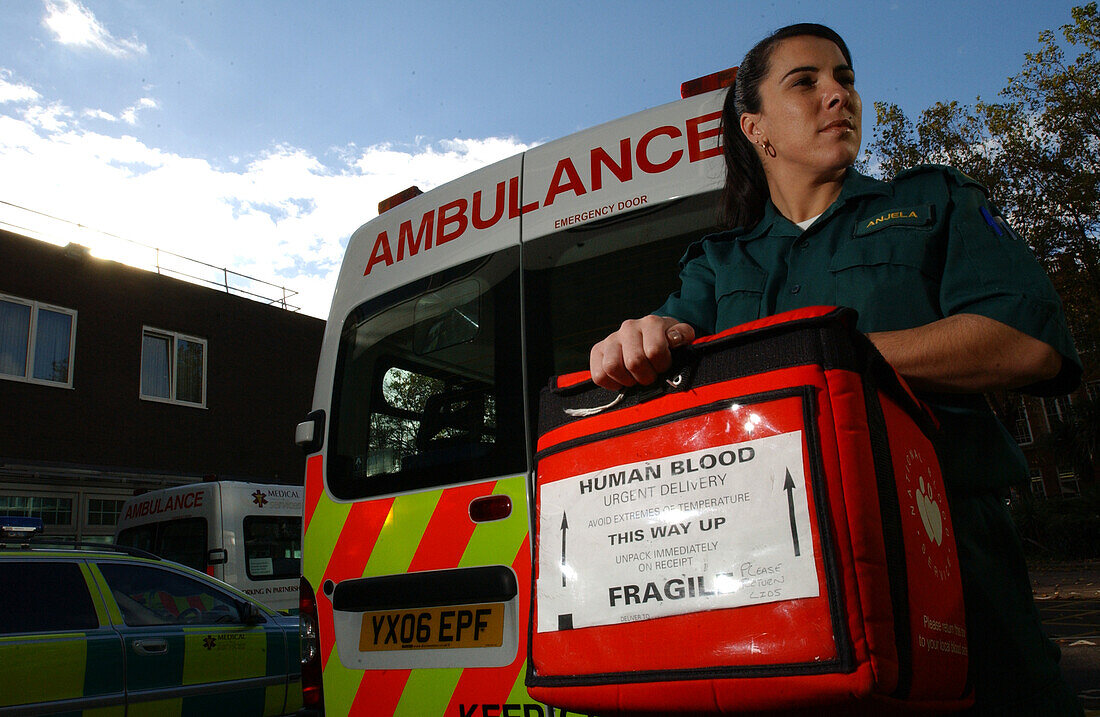 Emergency medical technician transporting human blood