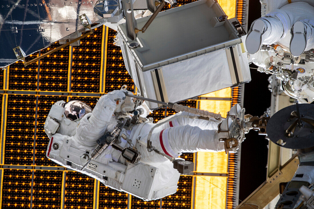 NASA astronauts carrying out ISS repair work