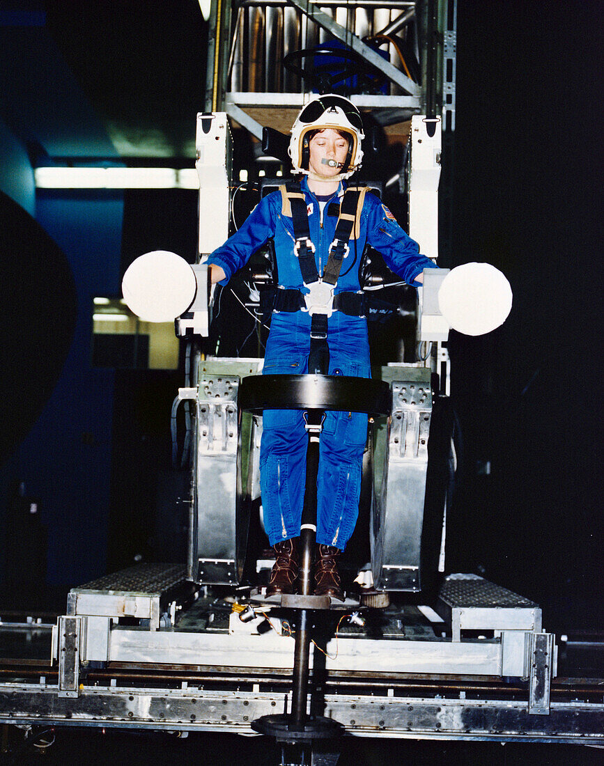 NASA astronaut testing a Manned Maneuvering Unit prototype