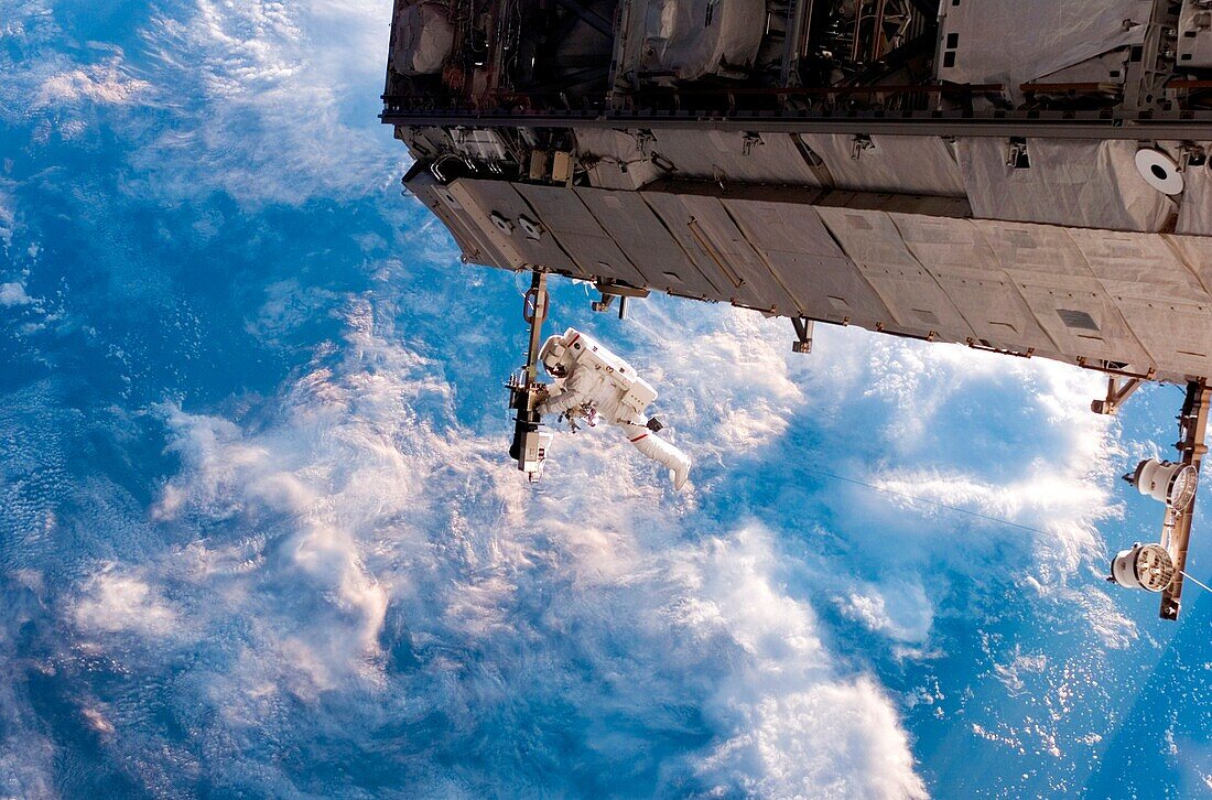Astronaut Curbeam performing spacewalk