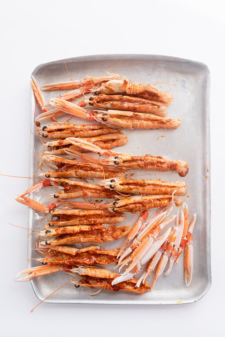 Peri-peri king prawn on an aluminium tray