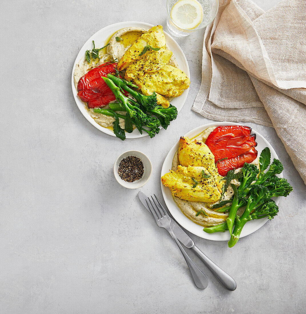 Turmeric chicken with butter bean hummus and roasted peppers