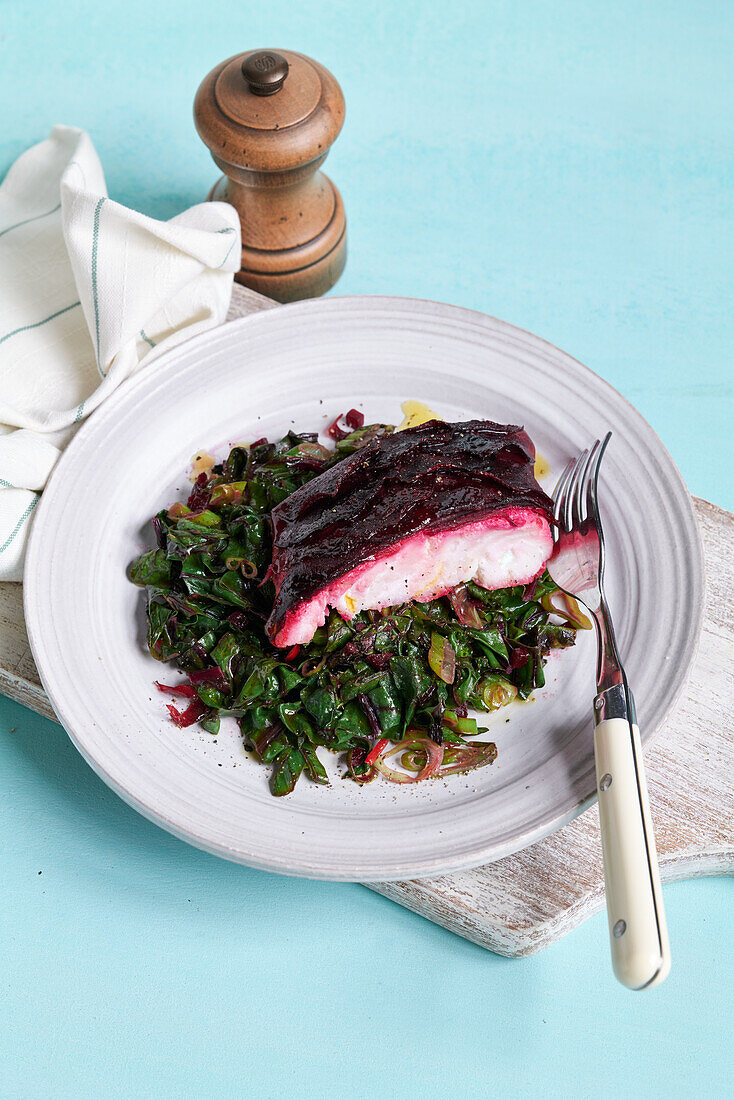 Fish fillet with beetroot and chard vegetables
