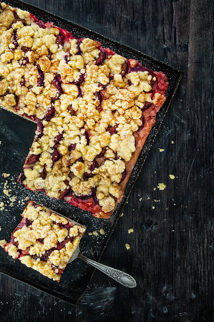 Juicy plum doughnut cake with butter crumble
