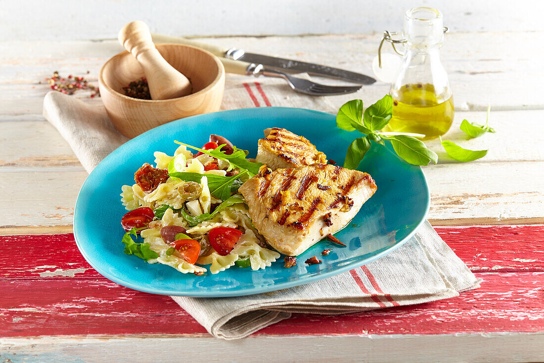 Grilled turkey breast with pasta salad