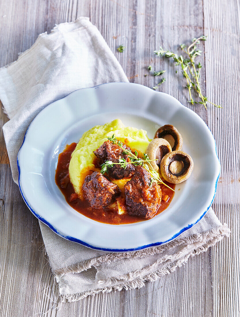 Beef cheeks on red wine and thyme with potato celery mash