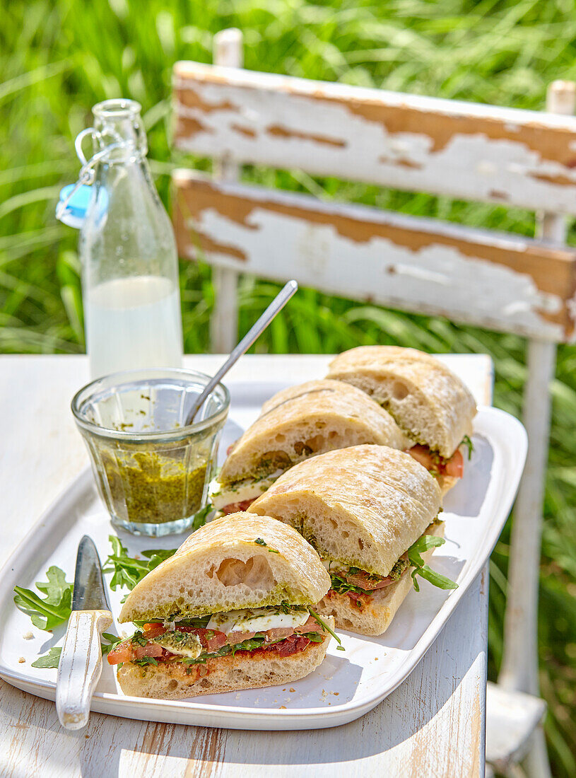 Caprese sandwiches with homemade basil pesto