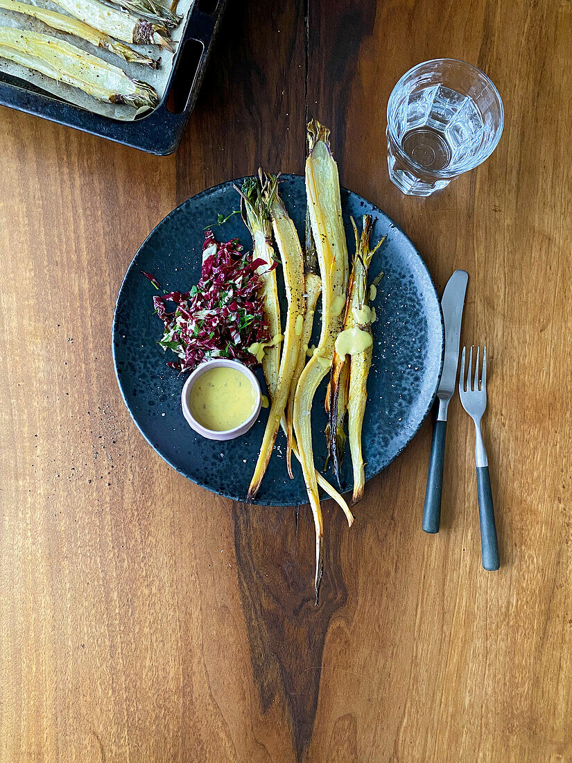 Oven-baked parsley roots with a caper-and-mustard mayonnaise and a radicchio salad