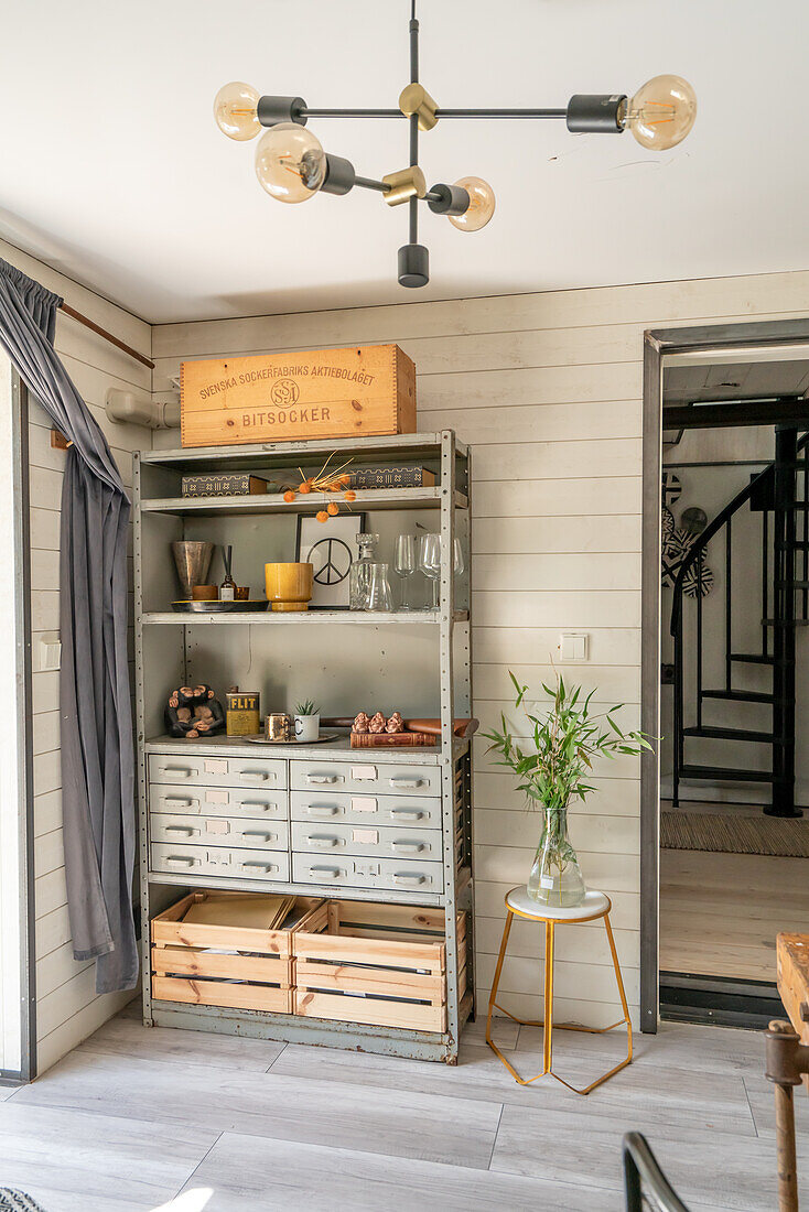 Old archive shelf with wooden crates in the study