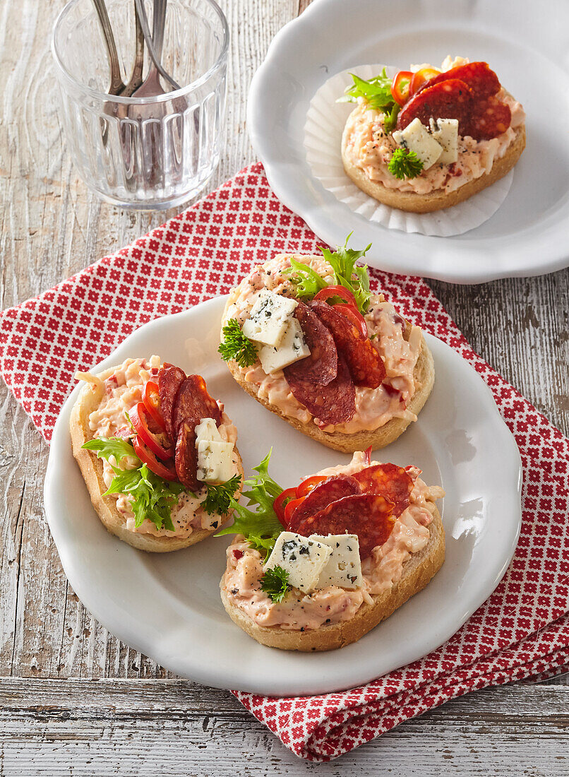 Open sandwiches with spicy Hungarian sausage