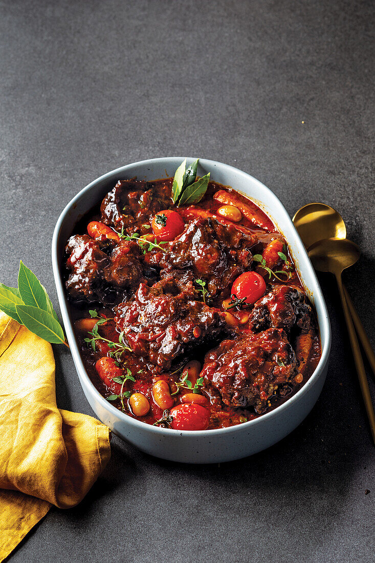 Tomato and chilli oxtail with butter beans