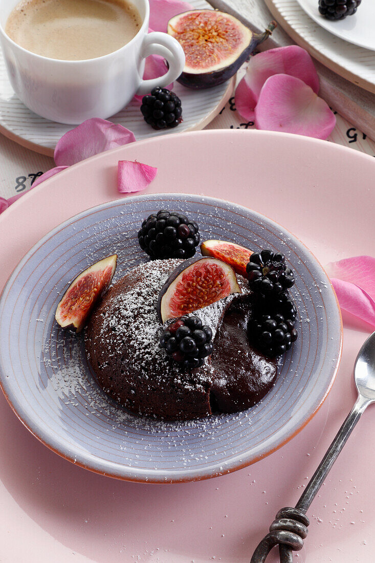 Chocolate lava cake with blackberries and figs