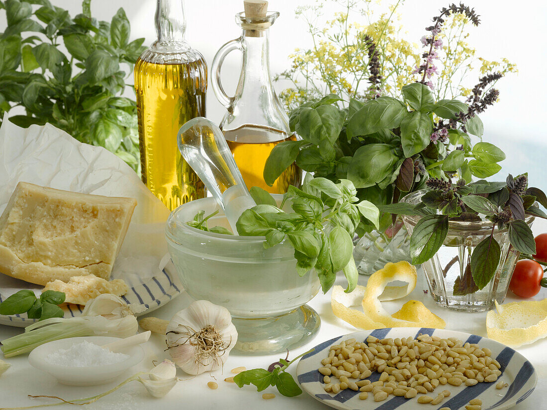 An arrangement of ingredients for basil pesto