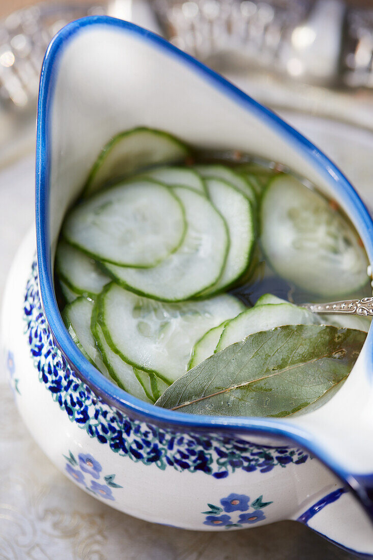 Cucumber salad in ceramic dishes