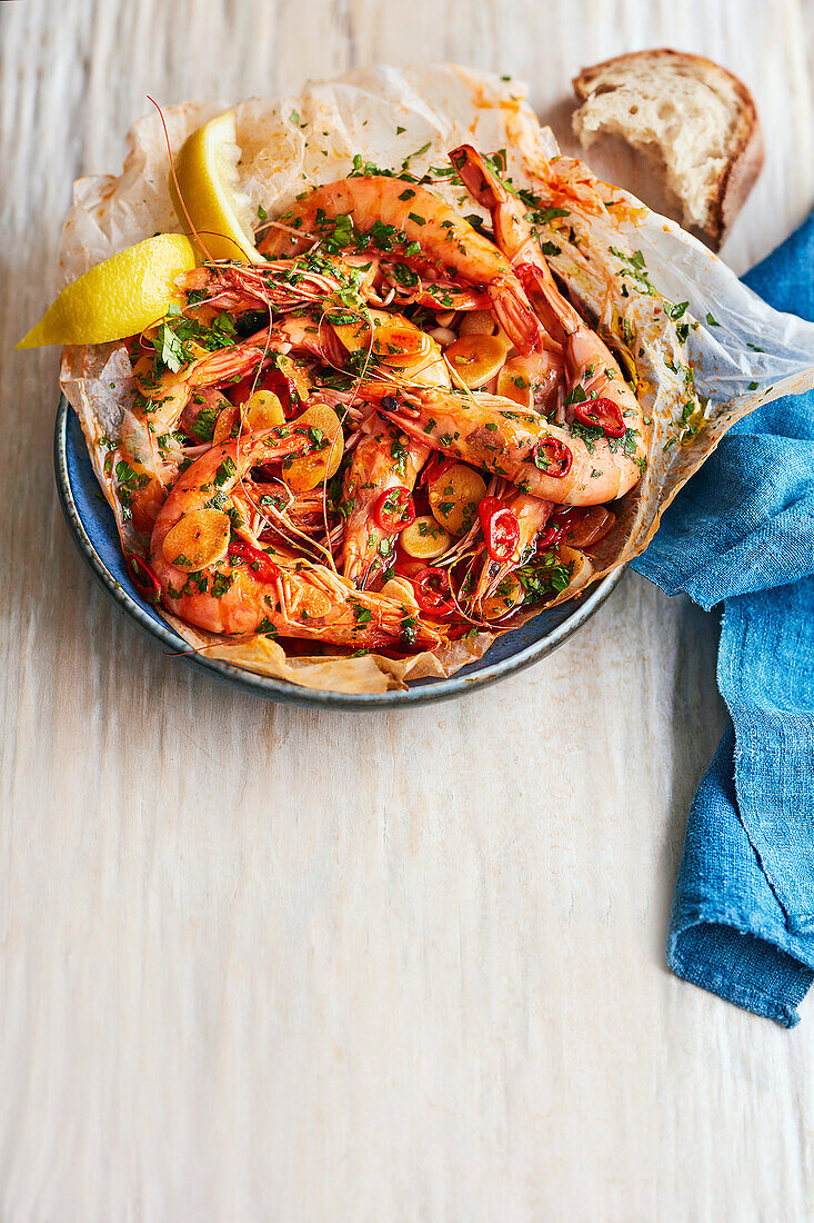 Paper bag prawns with sherry, chilli and garlic