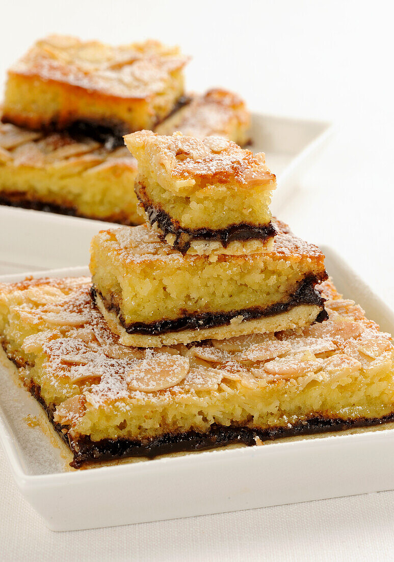 Slices of plum squares with almonds