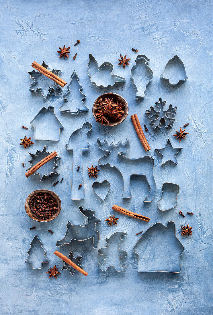 Christmas cookie cutters with star anice and cinnamon sticks