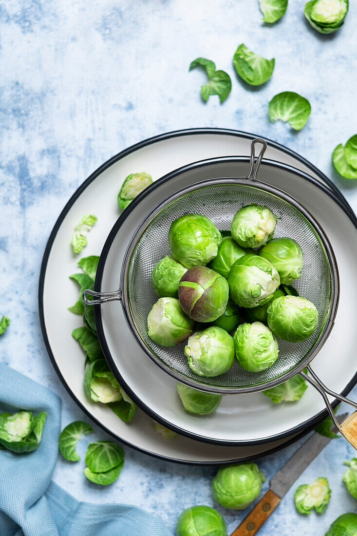 Washed brussel sprouts in a colander