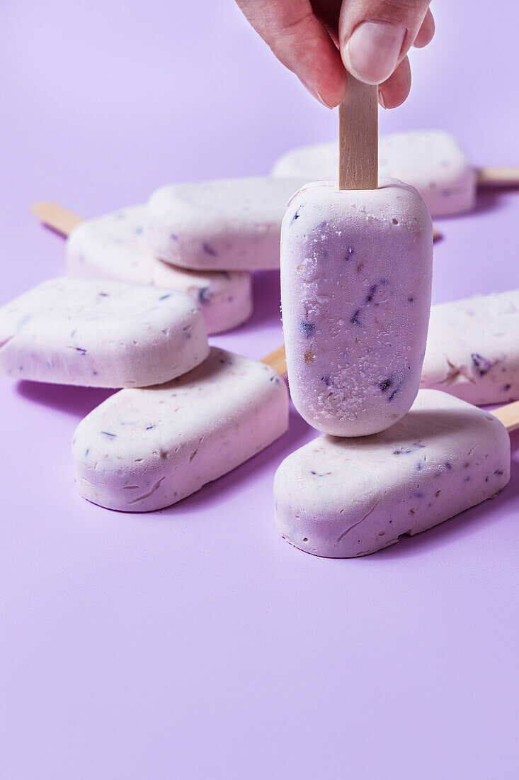 Homemade blueberry and cheesecake ice popsicles
