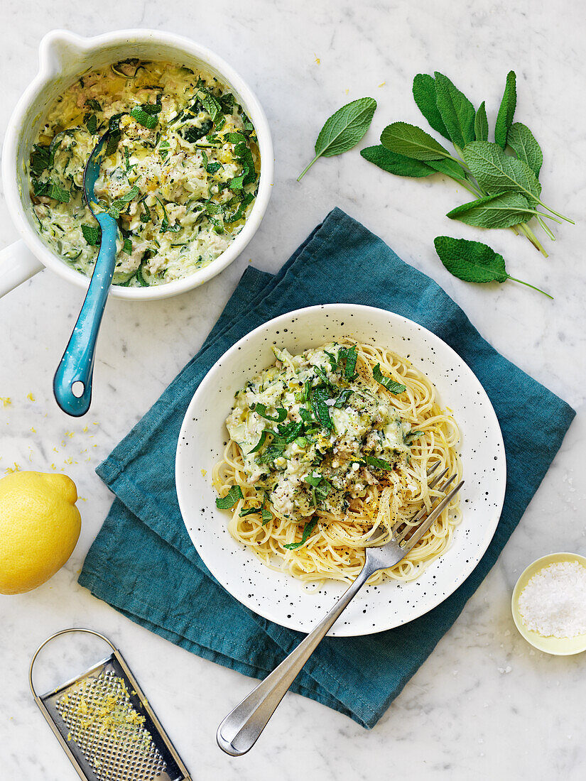 Pasta with chicken, feta cheese, lemon and sage