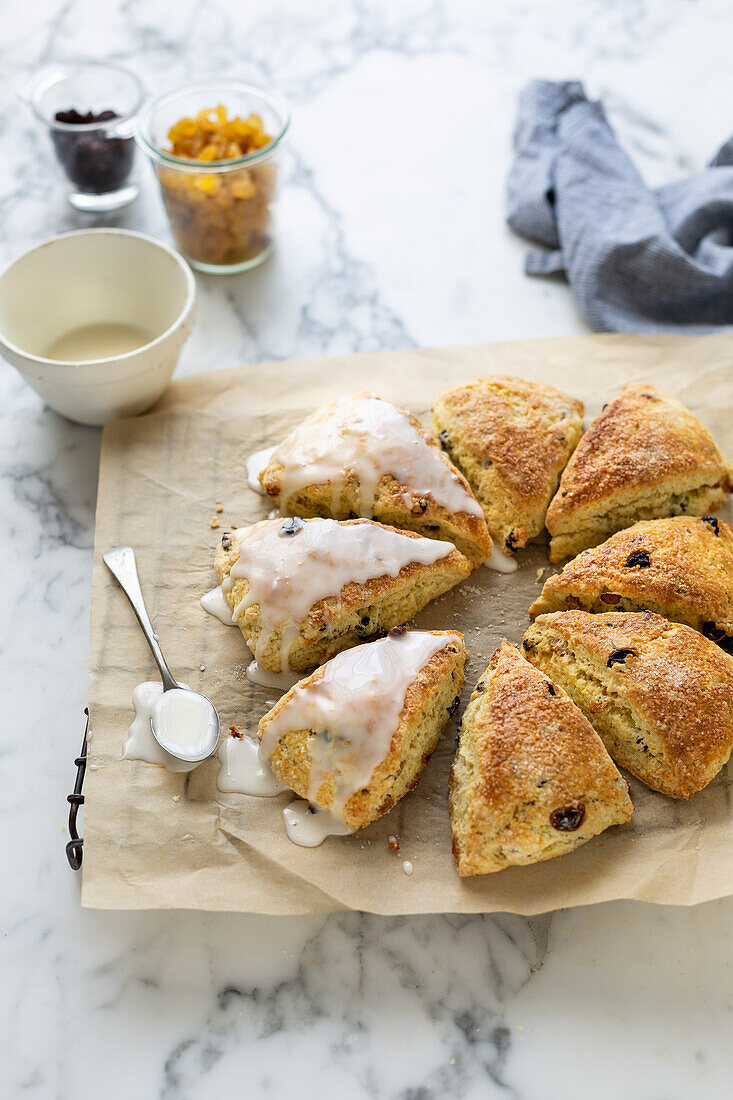 Scones with sultanas and sugar icing