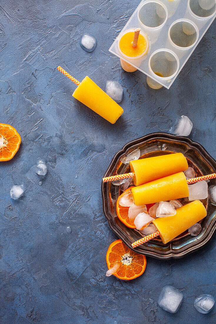 Homemade orange popsicles