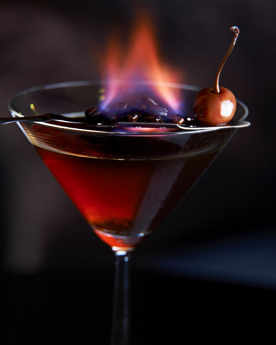 Manhattan cocktail, flambéed