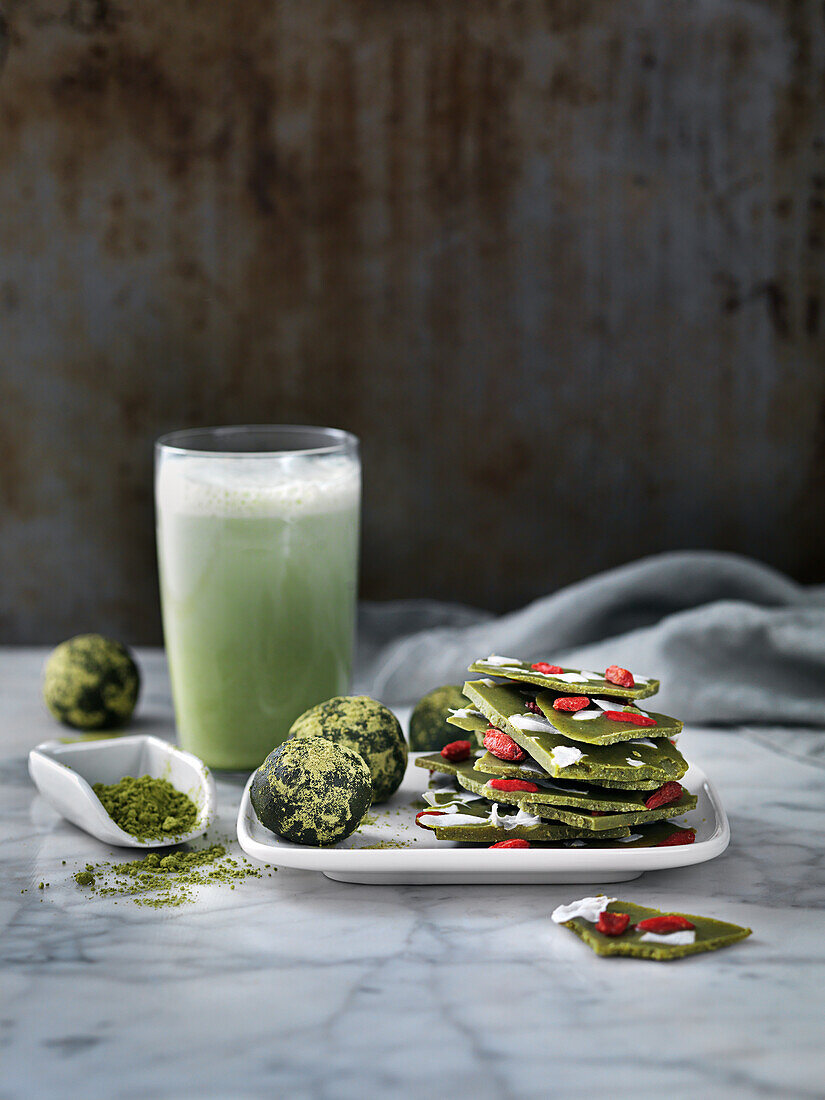 Machatea, bliss balls with macha, white chocolatebrittle with macha and dried fruit, machalatte