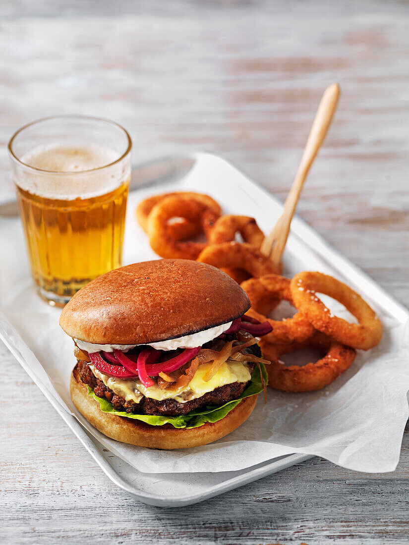 Vegan pattie burger and fried onion rings