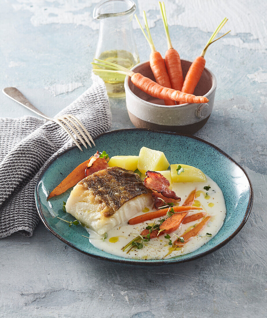 Cod fish and carrots in cream sauce