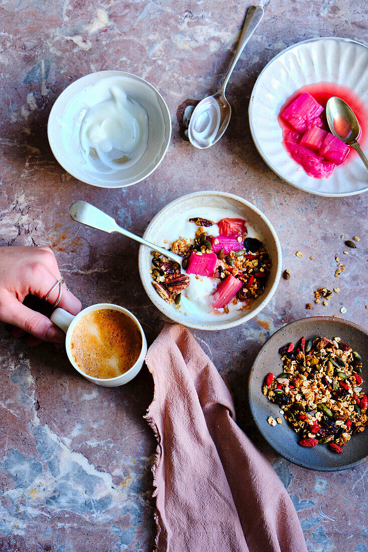 Homemade granola with rhubarb compote and yoghurt