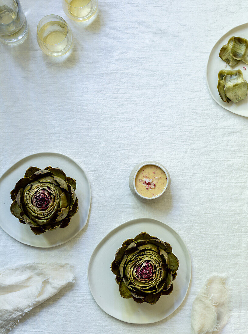Poached artichokes with a caper sauce