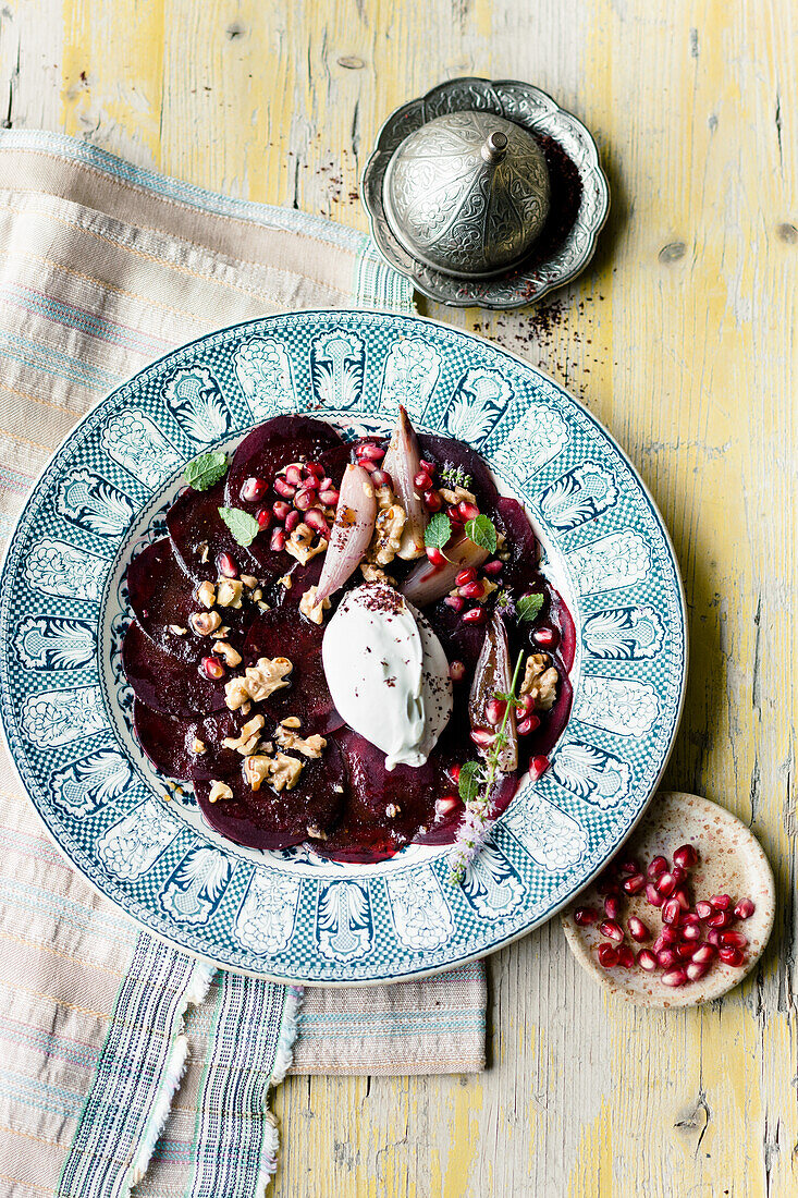 Oriental beetroot salad with orange, pomegranate seeds and nuts
