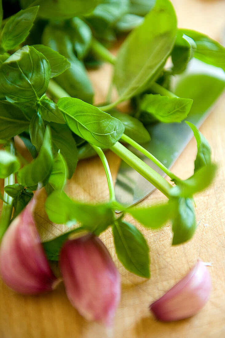 Fresh basil and garlic cloves