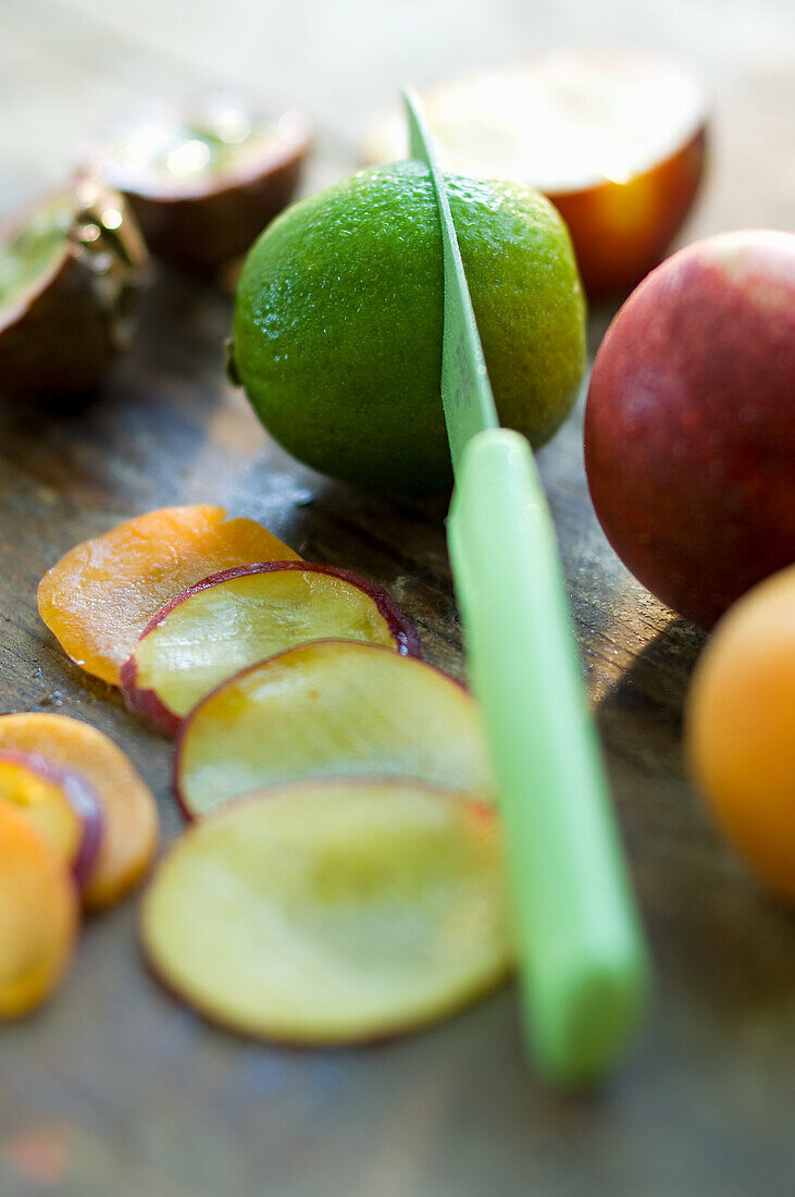 A lime being sliced (close up)