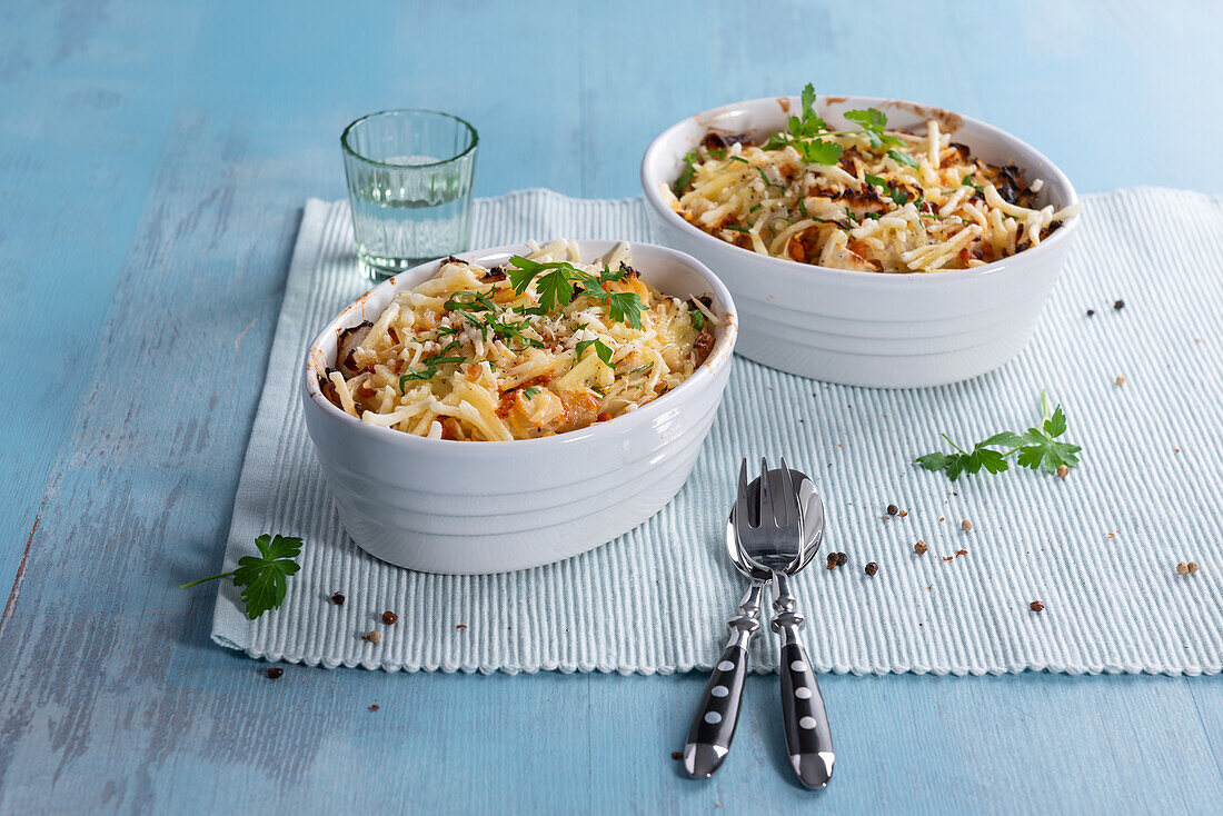 Vegan potato and pointed cabbage casserole with ground soy and plant-based cheese