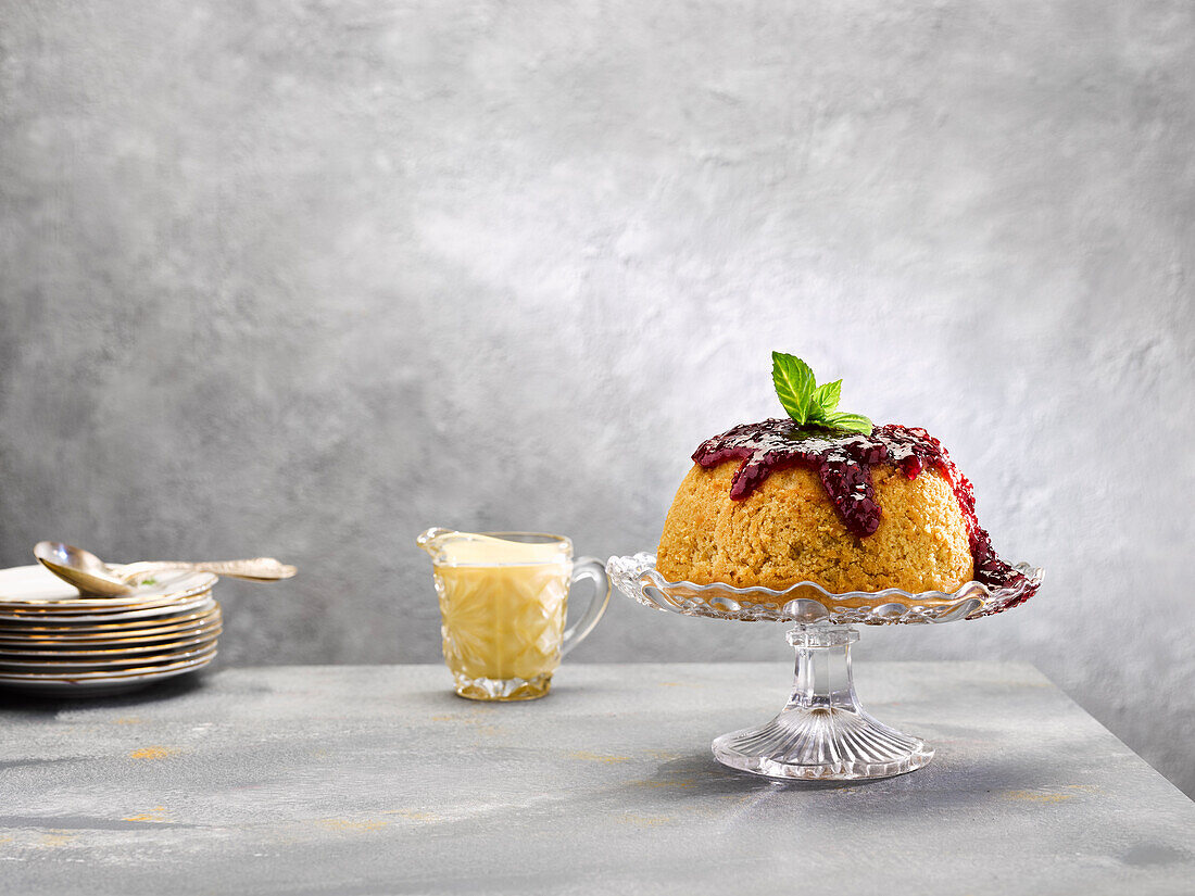 Vegan, steamed pudding with jam