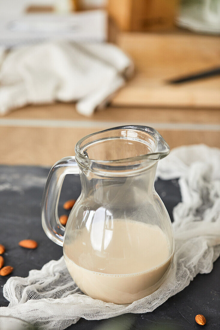 Homemade almond milk in a jug