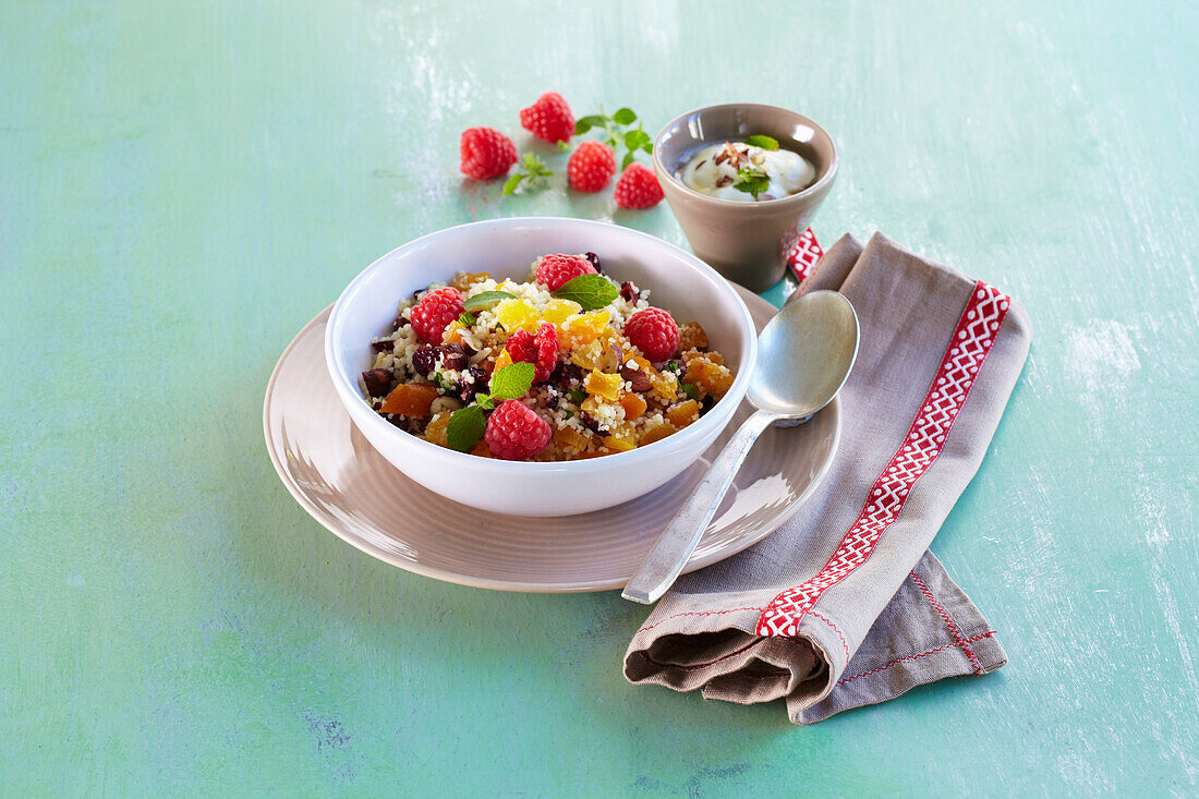 Couscous with dried apricots, raspberries and nuts