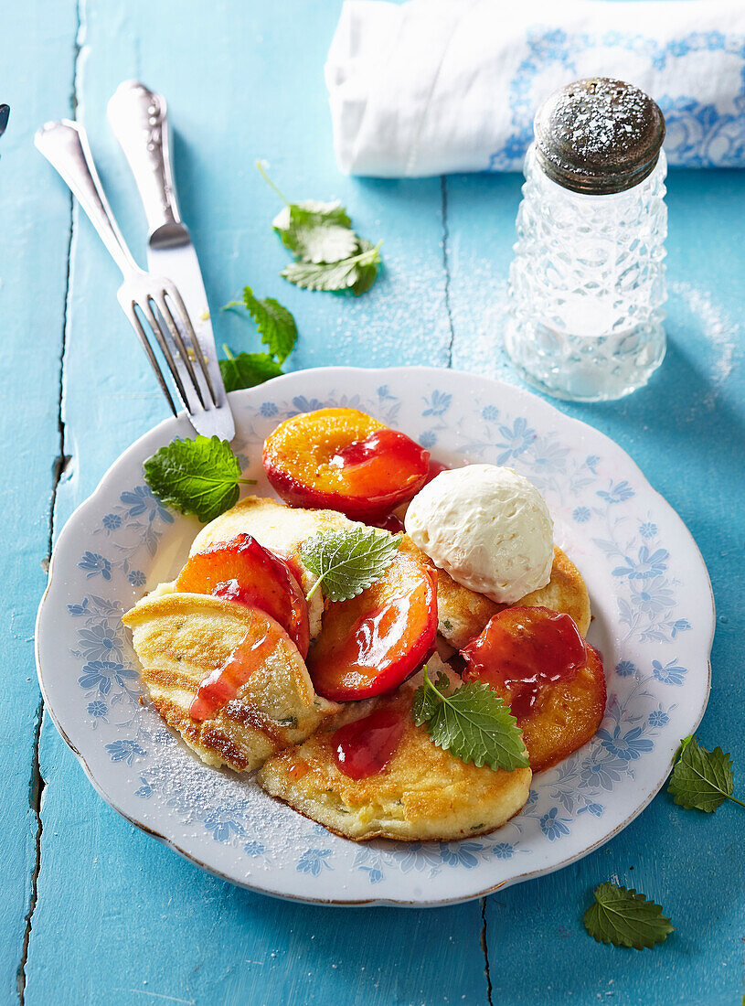 Empiror's pancake with baked peaches and ice-cream