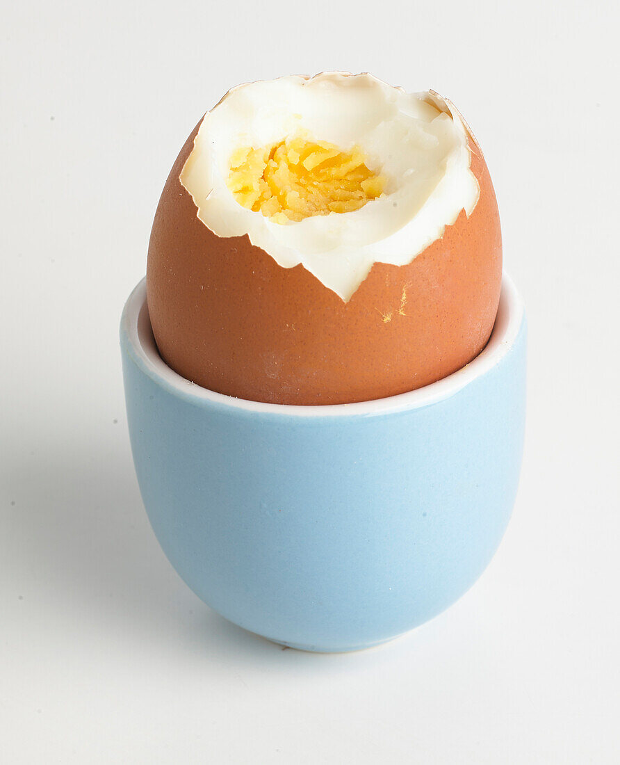 Boiled egg in a cup