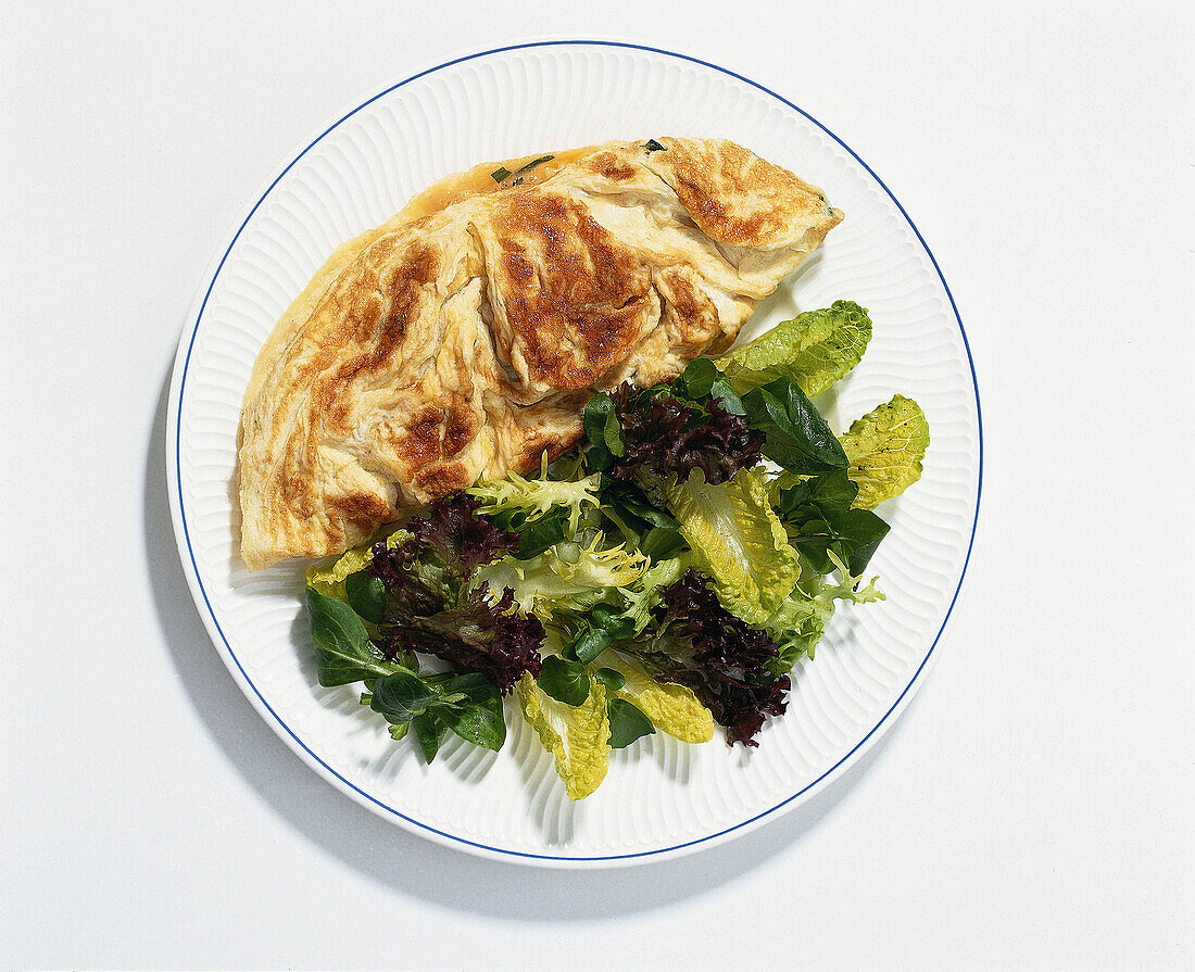 Omelette served with green salad