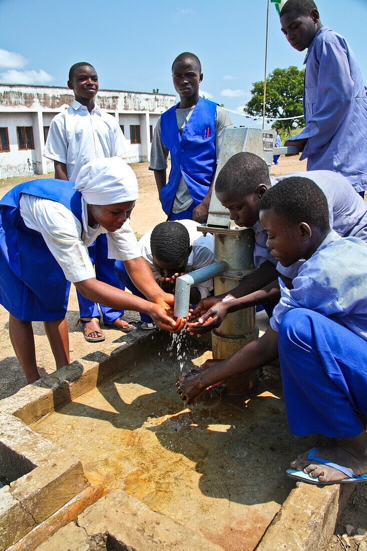 Pupils washing their hands