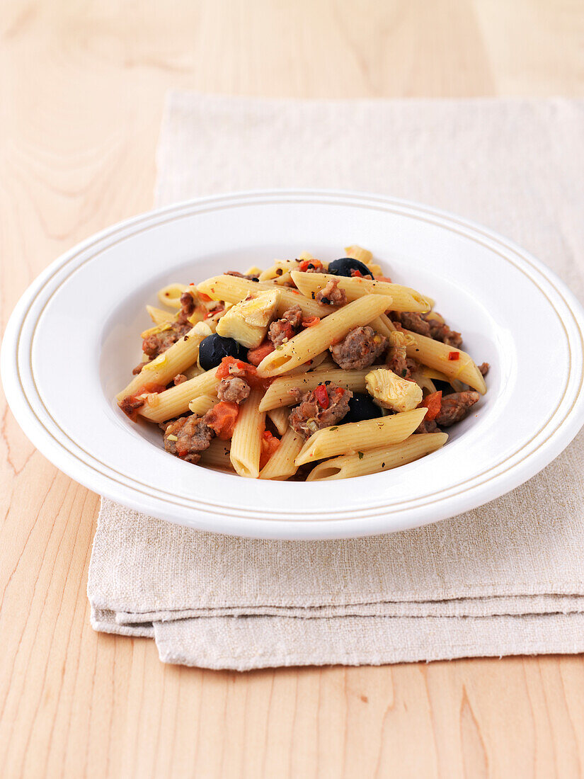 Pasta with sausage and artichoke